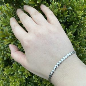 silver heart bracelet outside
