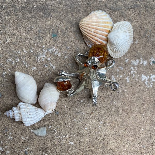 amber octopus brooch with seashells