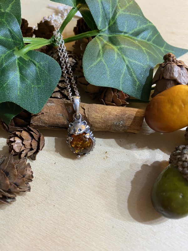 amber hedgehog pendant with acorns